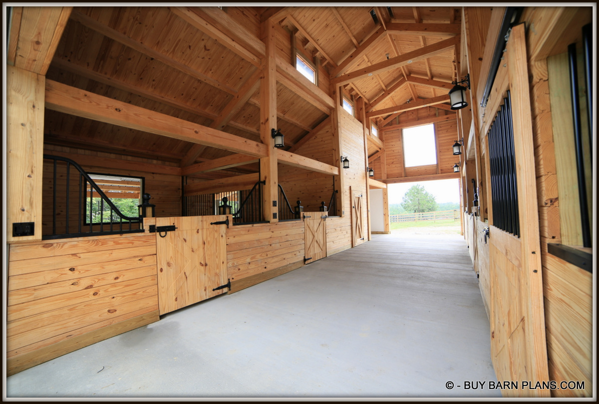 Photo Image Of A 12 x 48 Aisle - 5 Stall Stall Monitor Horse Barn With Custom Everything - 2 x 6 T&G Yellow Everywhere