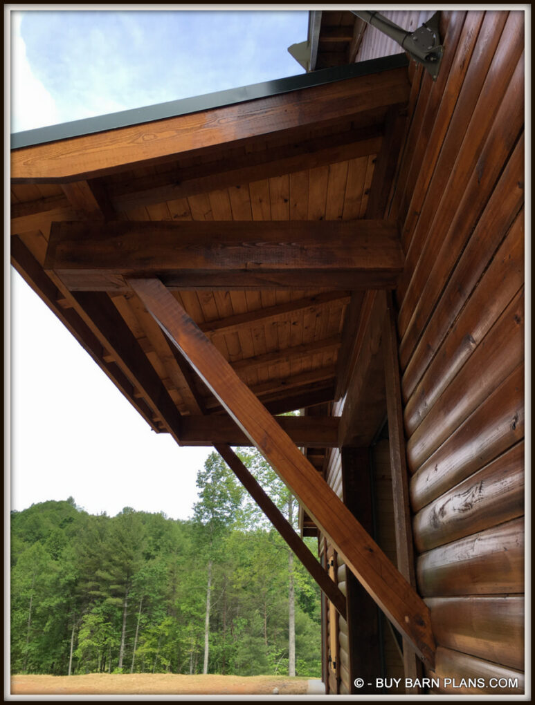 2 x 10 Beams That Cantilever 1 Third To The Outside With 6 x 6 Diagonal Struts For Support This Awning Roof