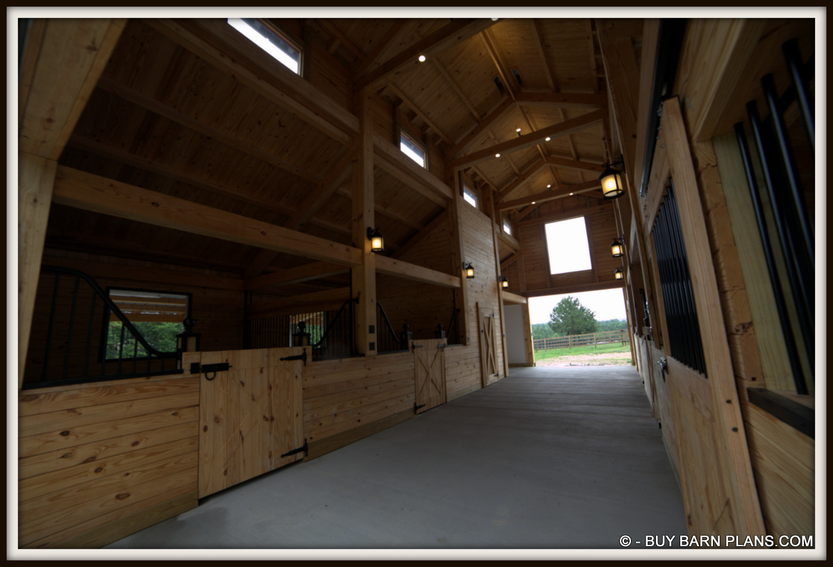 Photo Image Of A 12 x 48 Aisle - Five Stall Stall Monitor Horse Barn With Custom Everything - 2 x 6 T&G Yellow Everywhere