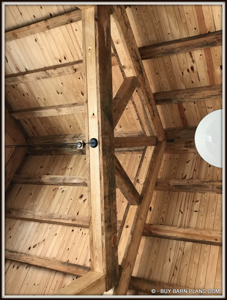 2 Stall Miniture Horse Or Goats Barn With T&G Ceiling Finish Over 6 x 6 Purlins Over - Hanging Farm Lights - Flood Lights Shinning On The Ceiling For Indirect Lighting