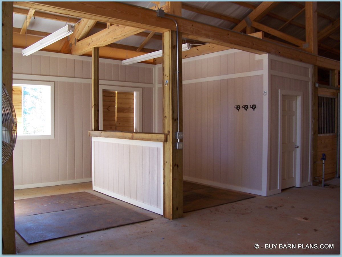 Photo Image View Of a Wash Area Of Twelve Stall Monitor Style Horse Built With Concrete Blocks and Stucco Finish