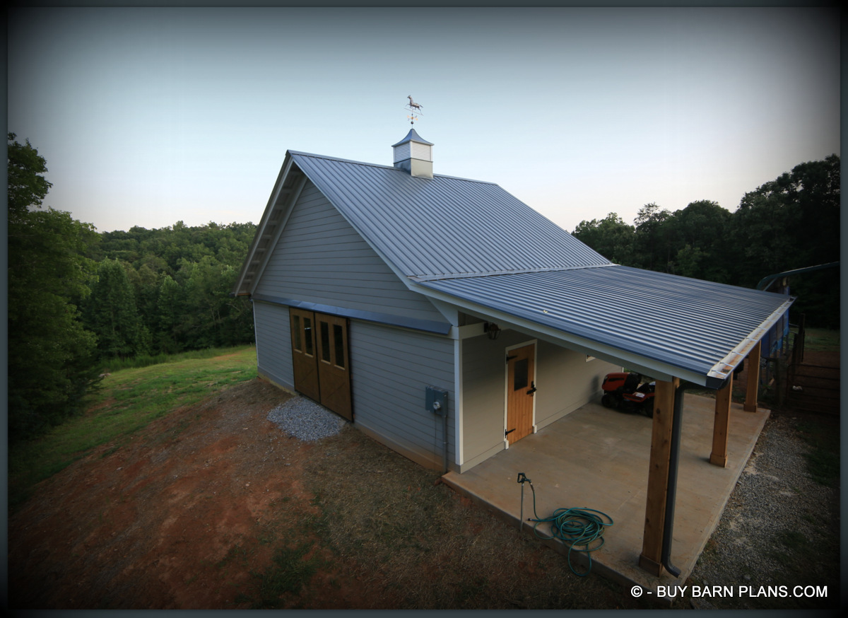 Photo Image 2 Stall Horse Barn Photo With Blue Ceiling Over 4 x 6 Purlims - Cedar Post - Custom Site Buile Entry Door And Hand Carved Crossbuck Aisle Doors