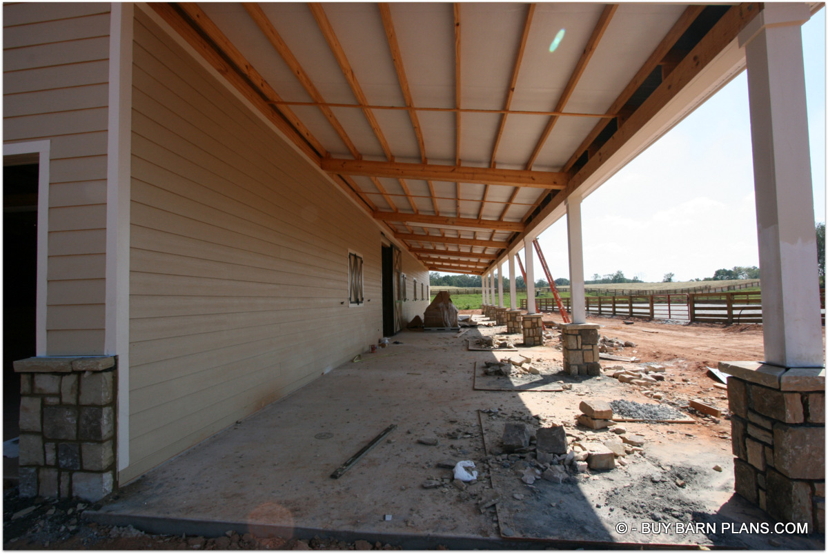 Photo Eight Stall Horse Barn With Concrete Covered Shed