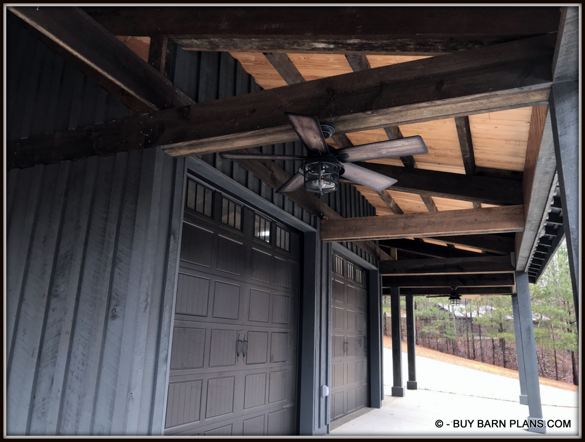 Exterior Photo View Of 1 x 6 T&G (Ceiling) Roof Decking Over 4 x 6 Stained Purlins Over Massive King Trusses- This Gearhead Garage That Looks Like A Rustic Barn