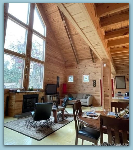 Photo Image Of Fireplace In The Living Room - Passive Solar Barn Style Home In The Mountains