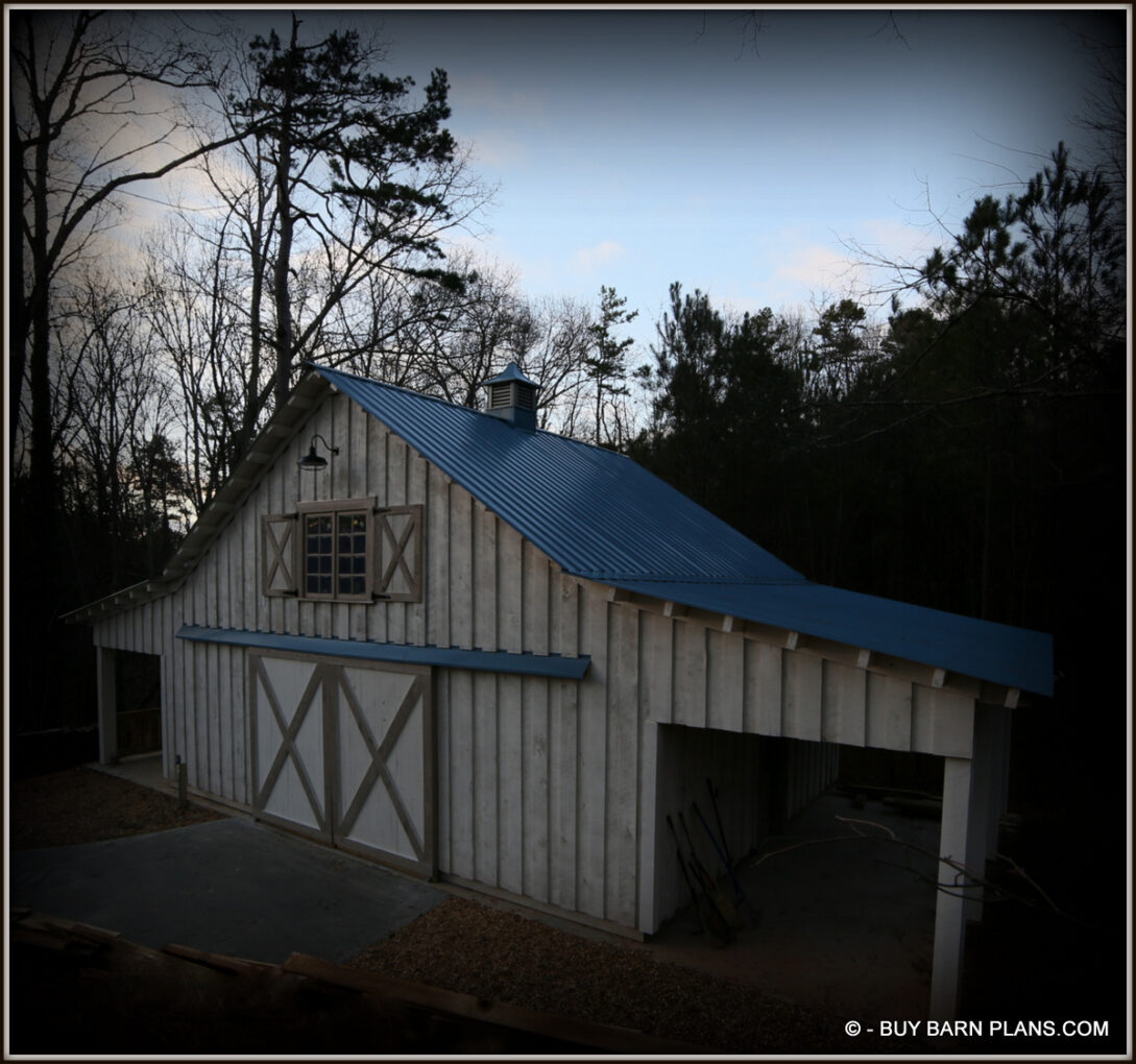 Photo Image Of Workshop Barn With Two Side Sheds - Board On Board Poplar Siding - Blue Metal Roof - Sliding Barn Doors