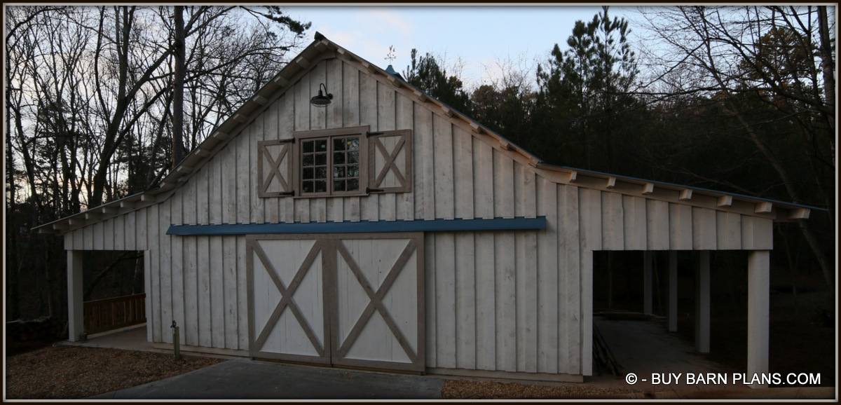 Photo Image Of Workshop Barn With Two Side Sheds - Board On Board Poplar Siding - Blue Metal Roof - Working Shutters - Sliding Barn Doors -
