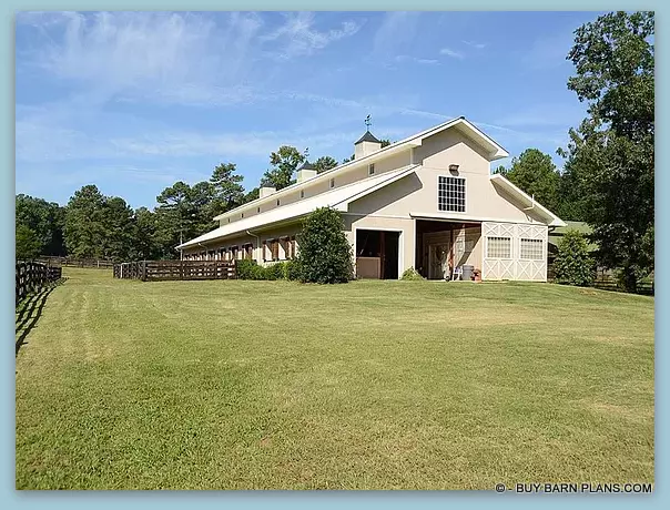 Completions Of Twelve Stall Monitor Style Horse Barn Built With Concrete Blocks and Stucco Finish