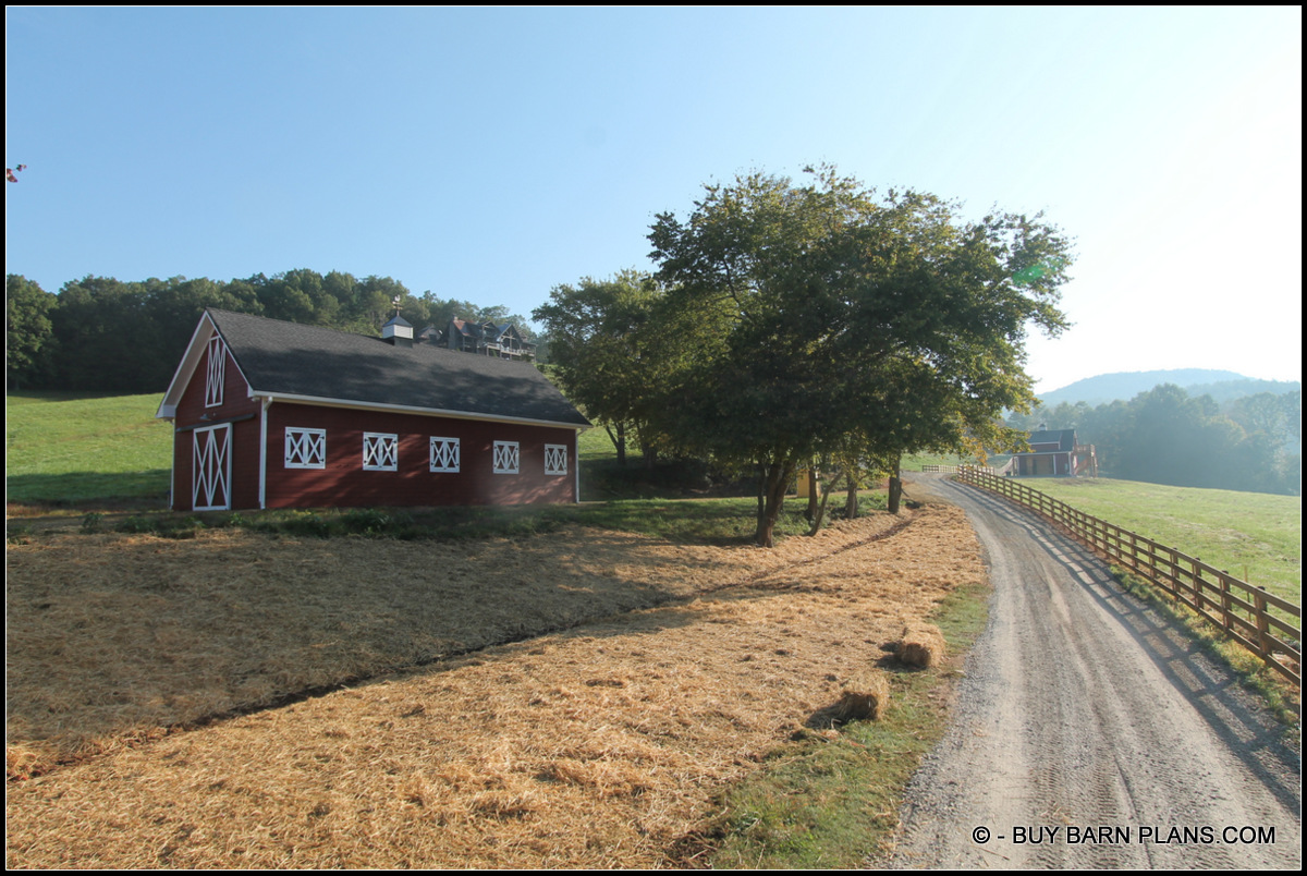Photo Of A Bright Red With White Trim - Working Saloon Style Windows - Tractor Storage Barn With Loft - Buy Barn Plans