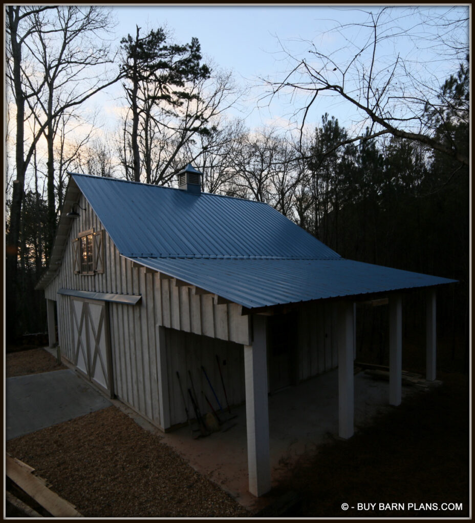 Photo Of Workshop Barn With Two Side Sheds - Board On Board Poplar Siding - Blue Metal Roof