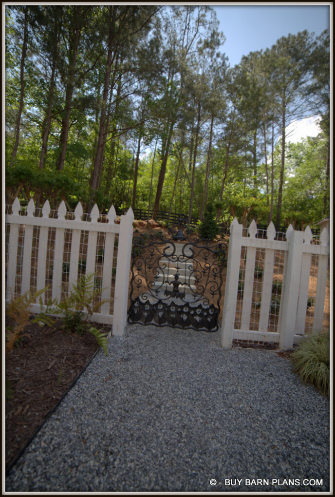 She Shed With Iron Gate and Lime Stone Steps