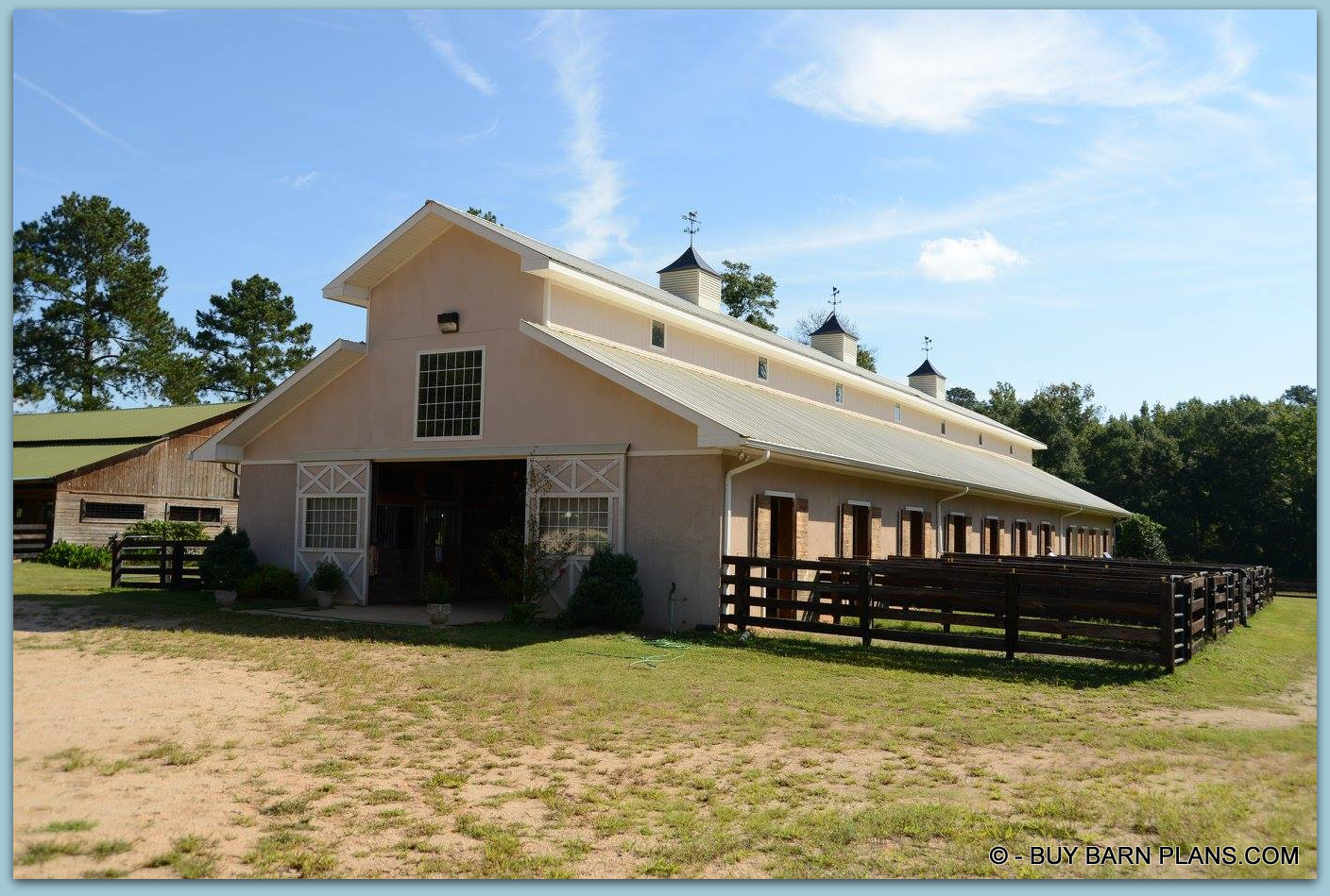 Completions Of Twelve Stall Monitor Style Horse Barn Built With Concrete Blocks and Stucco Finish